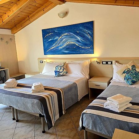 Hotel Orchidea Lignano Sabbiadoro Bagian luar foto
