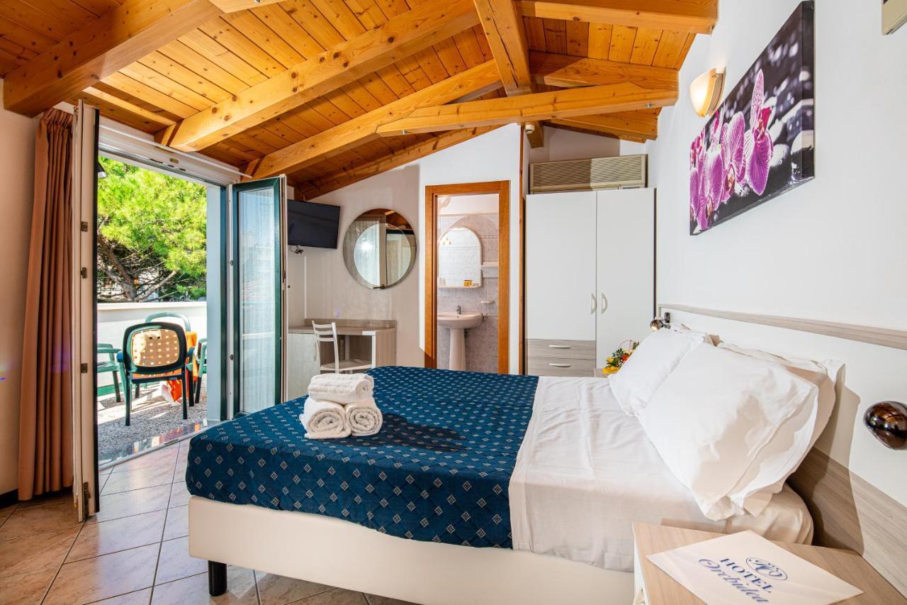 Hotel Orchidea Lignano Sabbiadoro Bagian luar foto